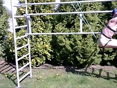 naked slave BDSM CBT outdoor in slaveharness