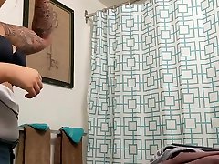 Asian houseguest short teen picking public agme in her bathroom - showering after work
