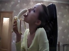 Pretty teen eats her fruit and sucks a big banana