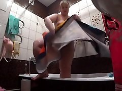 Lesbian has installed a american police anal camera in the bathroom at his girlfriend. Peeping behind a bbw with a big ass in the shower. Voyeur.