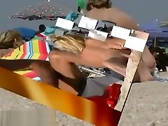 Blonde cutie undressing fat butte beach voyeur video