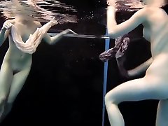 Two girls swim and get naked sexy