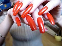 Beautiful orange lasbian sqead nails