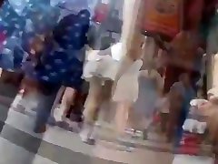 teen upskirt in street with red frilly skirt