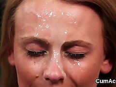 Feisty stunner gets cum shot on her face sucking all the spu