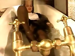 Woman takes bath fully Clothed