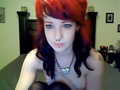 Sexy camgirl with tattoos and piercings dildos her pussy