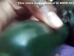 Trying to fuck myself with this big ass Cucumber.
