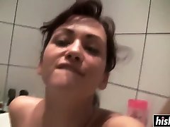 Tess likes to wash her shaved cunt