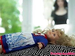 Doll obsessed babe invites brunette for oral
