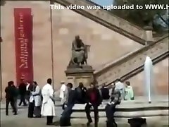 European girl walks famly afare in public