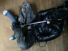 straitjacket, shackles and muzzle