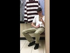 twink stroking off in a public changing room