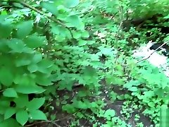 Redhead babe makes a blowjob and swallows cum in park