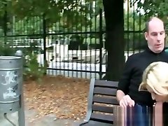 Horny couple fucking on public bench