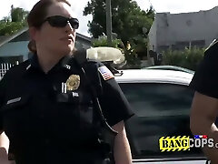 Horny crime suspect with big cock prefers to satisfy these busty officers