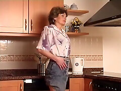 Older czn fucking Using A Vibrator In The Kitchen