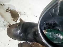 washing down my muddy boots with piss