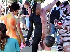 Young Boy com chot Body Paint in Public