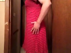 Crossdresser in pink stripped dress