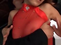 Asian lady in red gets sexy assets teased while dancing