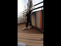 smoking and showing off cock on balcony