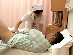 Naughty Japanese nurse gives her hot patient a hand job