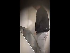 british lad pissing at train station