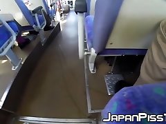 Japanese secretly pisses while riding in public transport