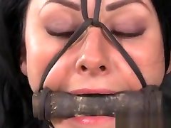 Brunette sub tied getting nipples clamped