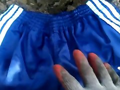 adidas nylon shorts in mud