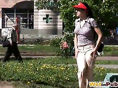 Lady in red cap wets herself completely