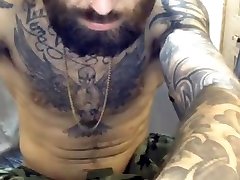 handsome muscled bearded hot tattoed guy showing off handsome muscled bearded hot tattoed guy showing off