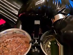 Slave Slut-Orgasma Celeste in black latex eating dog food and drinking piss