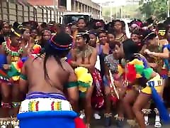 Topless African girls group dance on the street