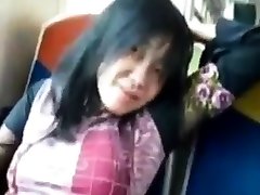 Asian milf rubs her masturbation use phone on a train.