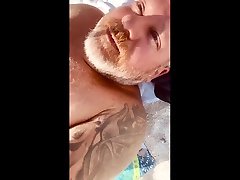 ginger chub shows cock and balls bulge at beach