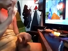 handsome police unifom sex junkie smoking naked while watching porn