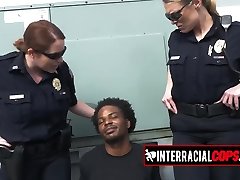 Public deep throat to a BBC criminal by two busty black cock gay poppers officers!