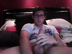 Young Canadian guy cums on his belly after masturbation