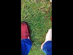 moccasins and sockless on the grass