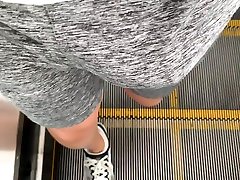 walking with amazing amateur konuk on grey net shorts in metro station again