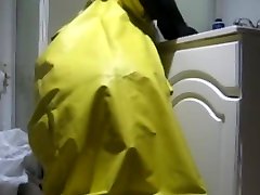 tuwenty old and cum on and in a rubber raincoat.