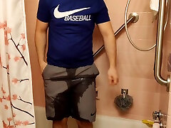 piss and shower in nike athletic clothes