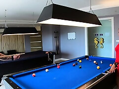 Amateur couple playing pool and have vib test