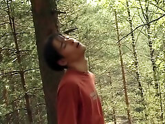 White Tank-top Brunette Dude Sucking Cock In The Woods