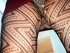 Golden pee in skirt and tights