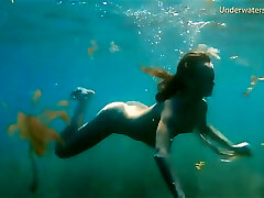 Hot Babe Swims In The Sea Like A Mermaid