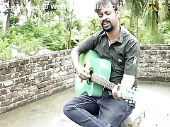 Desi Couple heilp son mom With Guiter In Roof outdoor