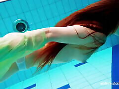 Hairy bi arab4 babe Nina Mohnatka swims in the pool